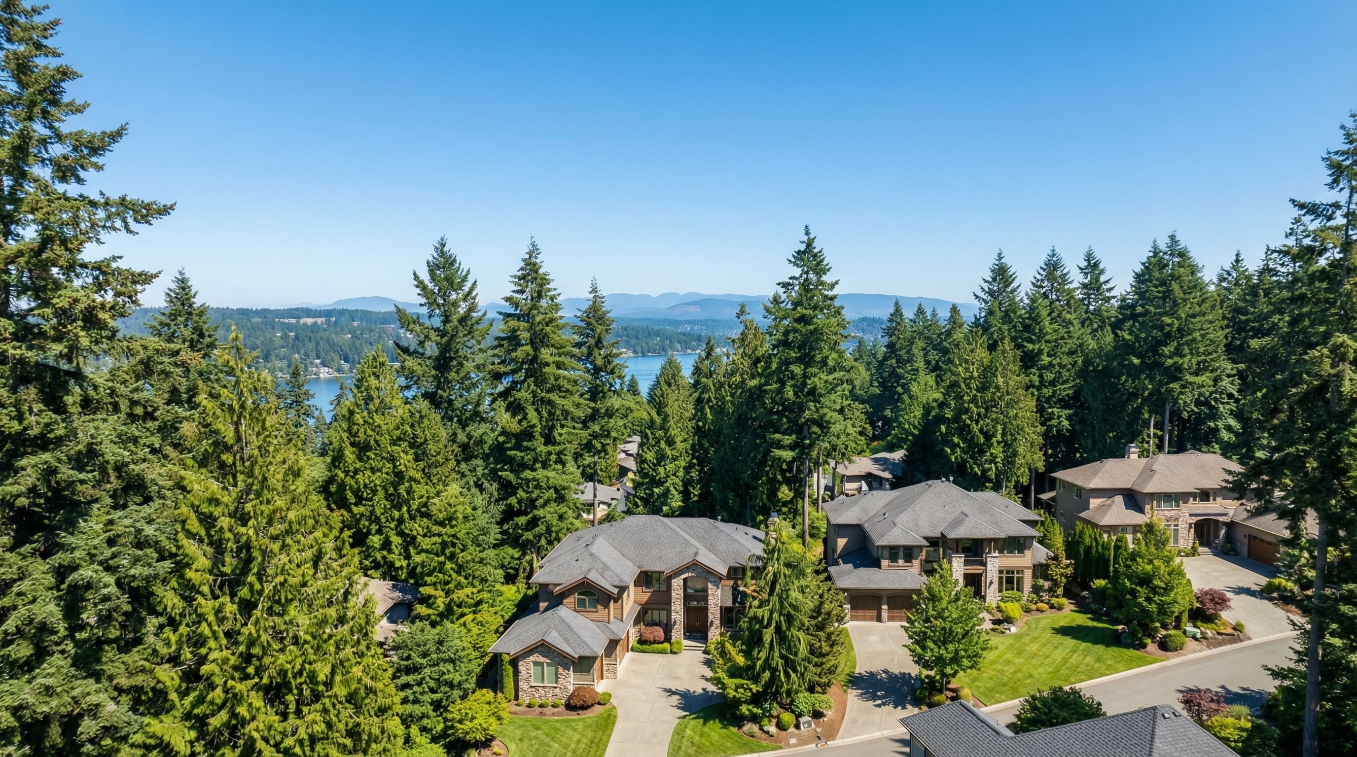 Sammamish Washington upscale plateau community with luxury homes, Lake Sammamish, evergreen forests, and Cascade Mountain views
