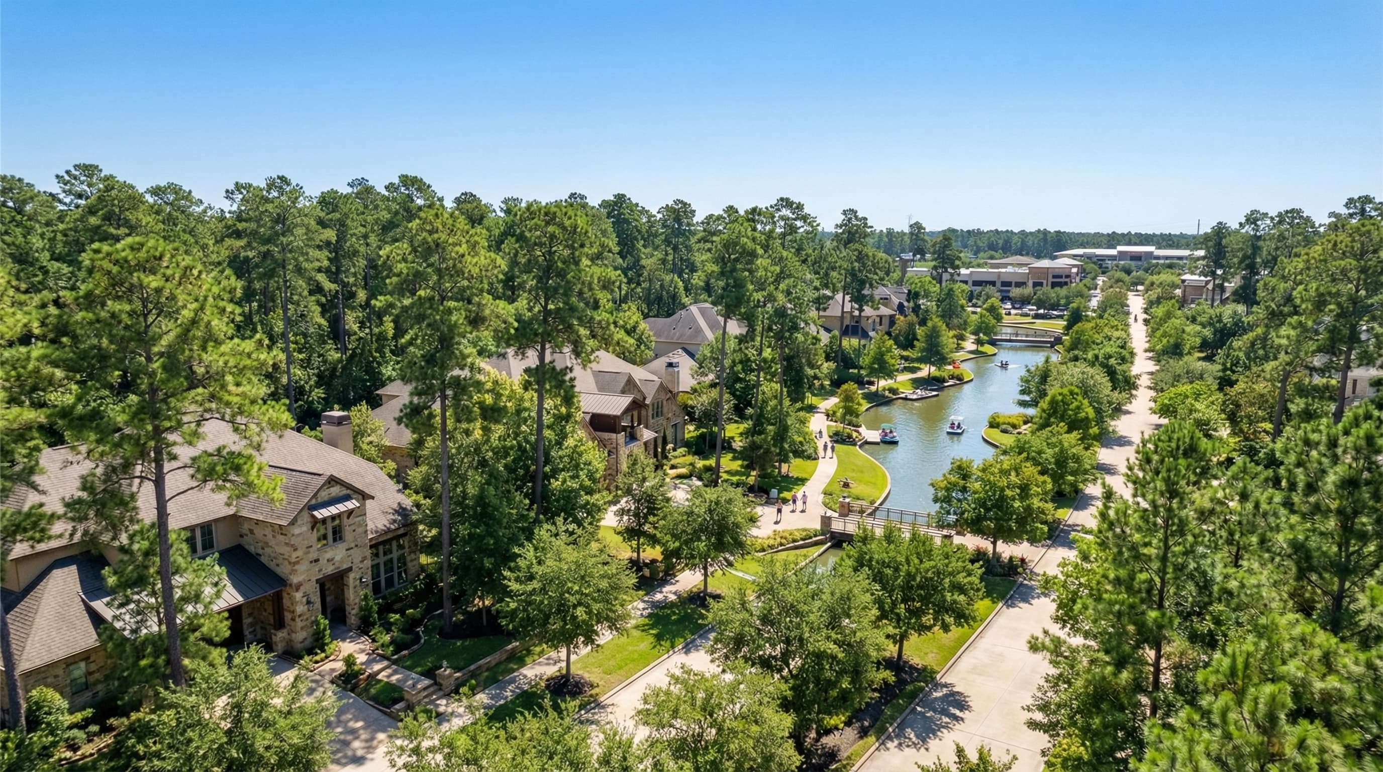 The Woodlands Texas master-planned community with Waterway district and forest canopy homes