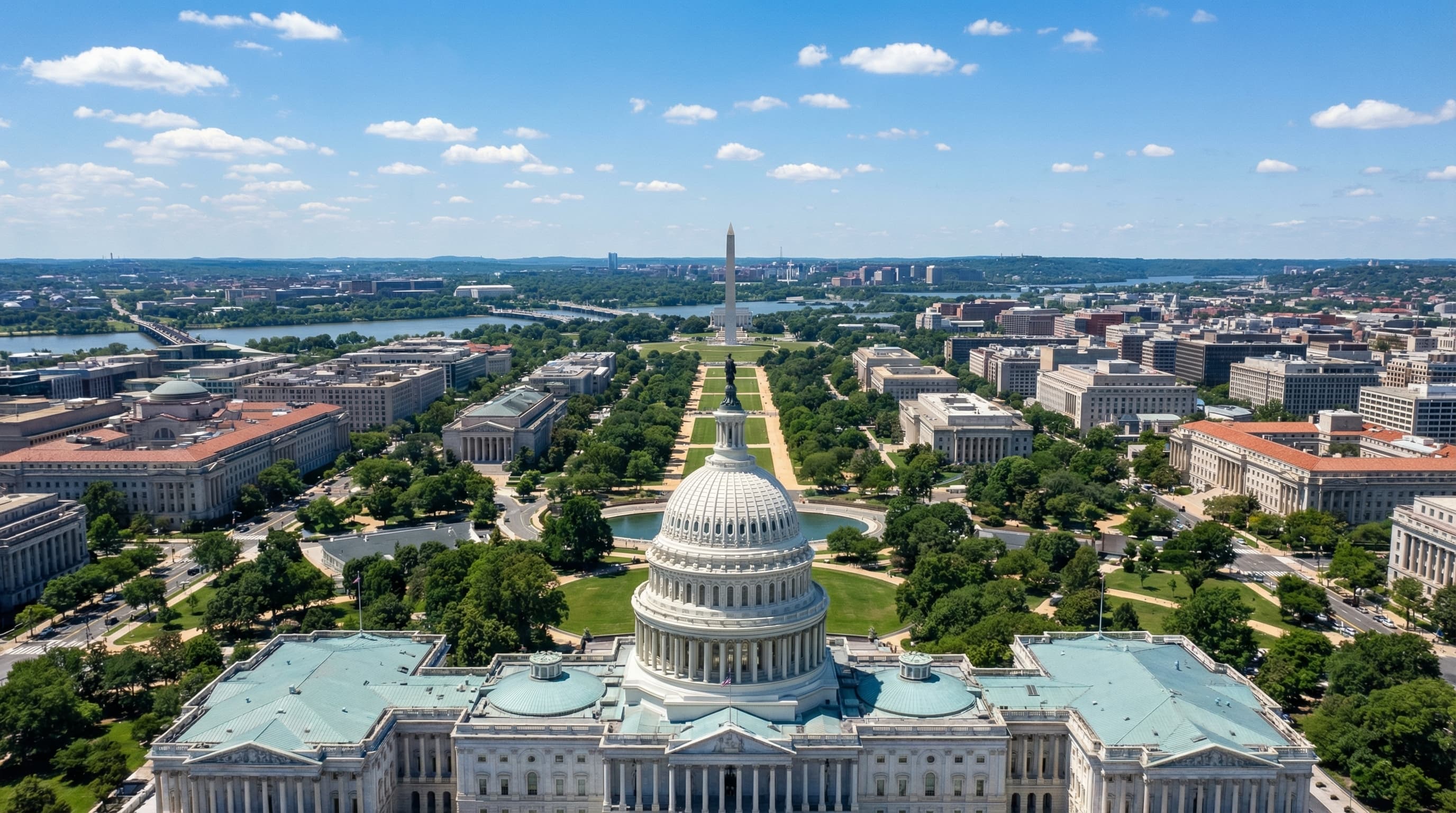 Aerial view of Washington DC metro area with Capitol, monuments, Potomac River, and Virginia skyline